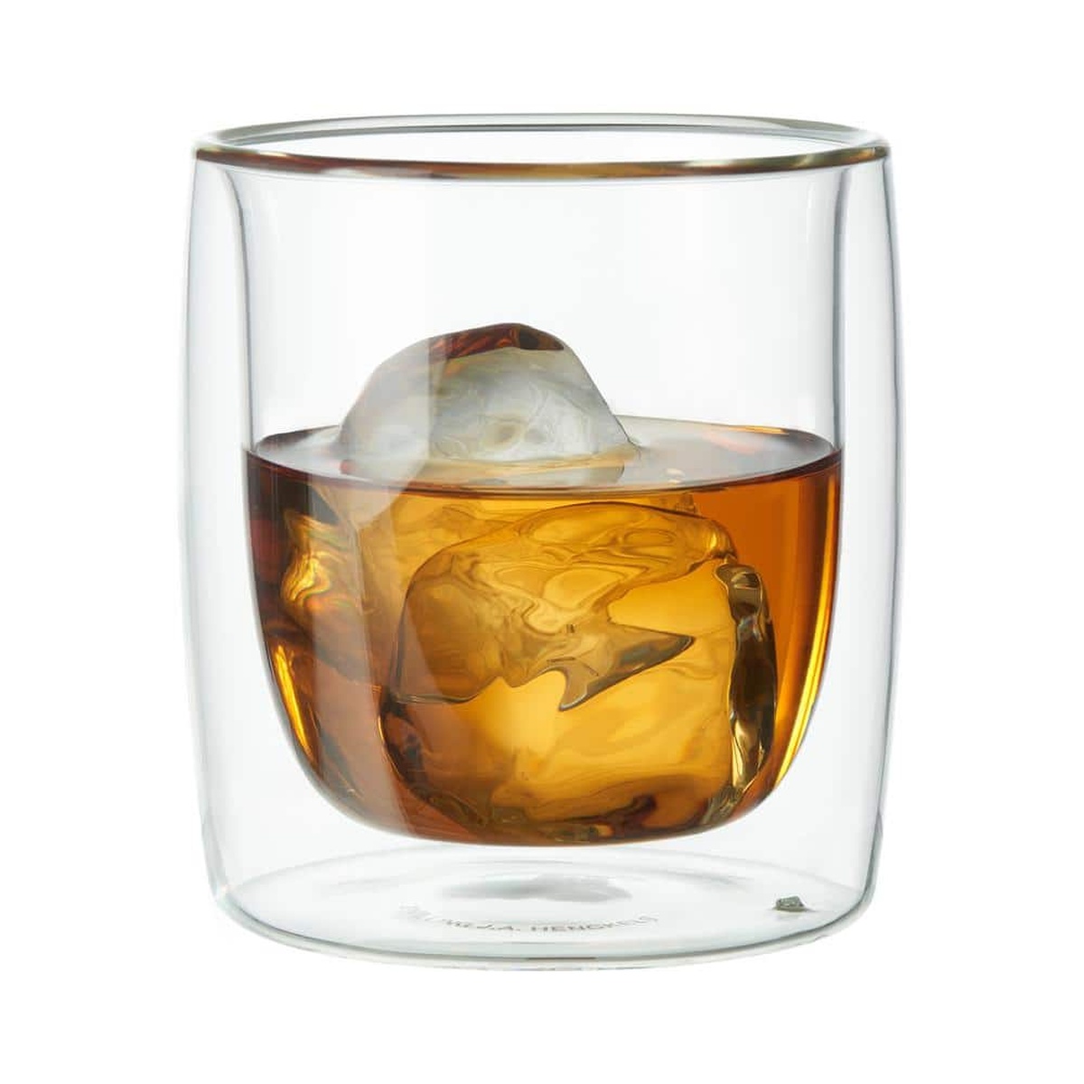 ZWILLING Sorrento double-wall tumbler filled with whisky and a large ice sphere, shown on a white background