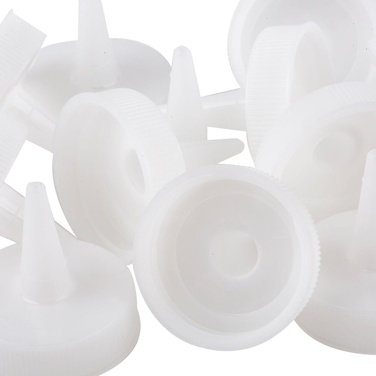 Multiple Tablecraft 100TC white cone tip caps grouped together, showing interior and tip angles