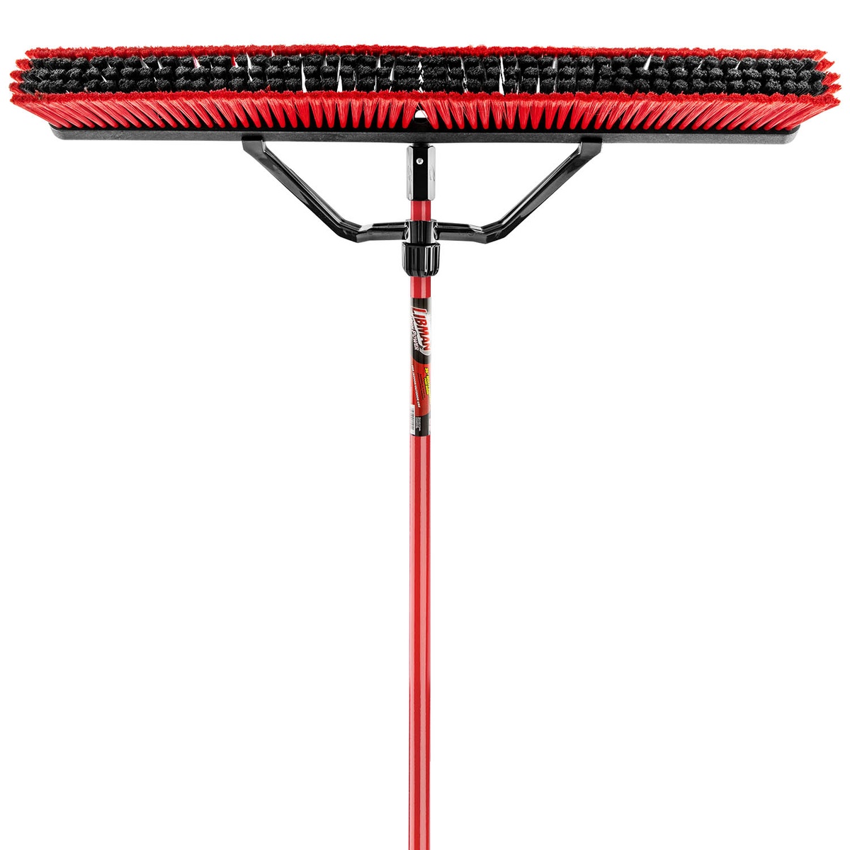 Libman Commercial Multi-Surface Heavy-Duty Push Broom with red and black fibers, black polymer brace, and red steel handle