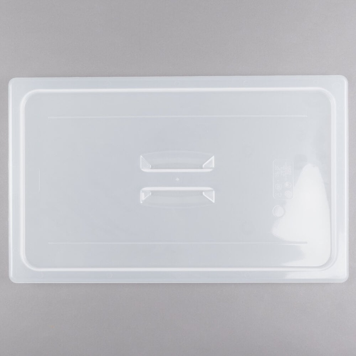 Cambro 10PPCH190 full size translucent polypropylene food pan lid with deep molded handle, top-down view on gray background