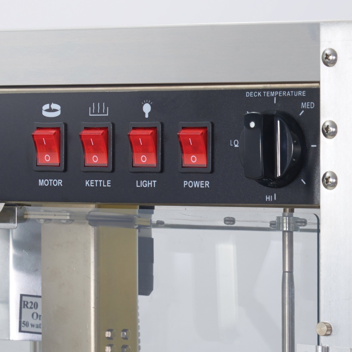 Close-up of popcorn machine control panel showing switches and deck temperature dial