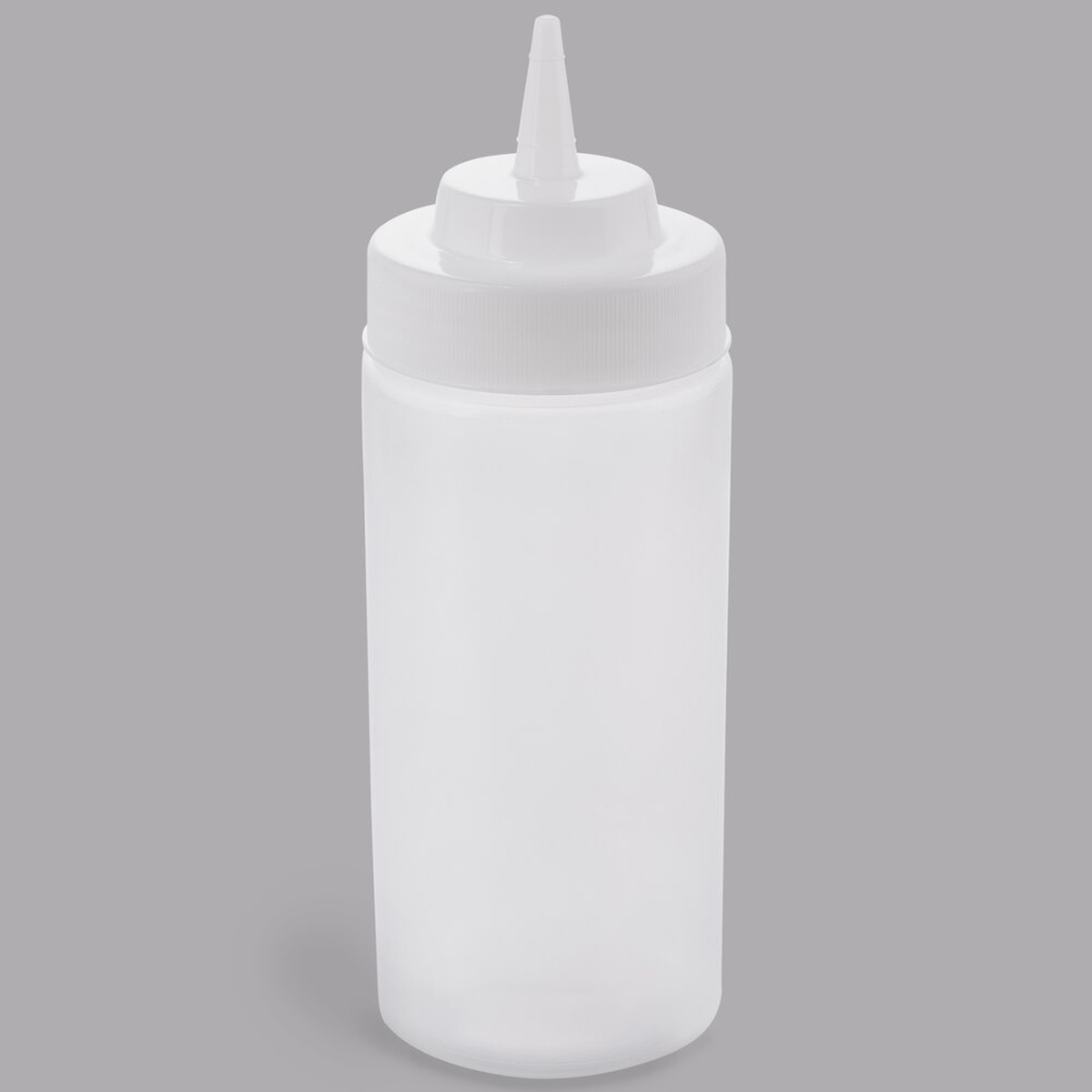 TableCraft 11663C 16 oz clear squeeze bottle with natural cone tip cap against a gray background