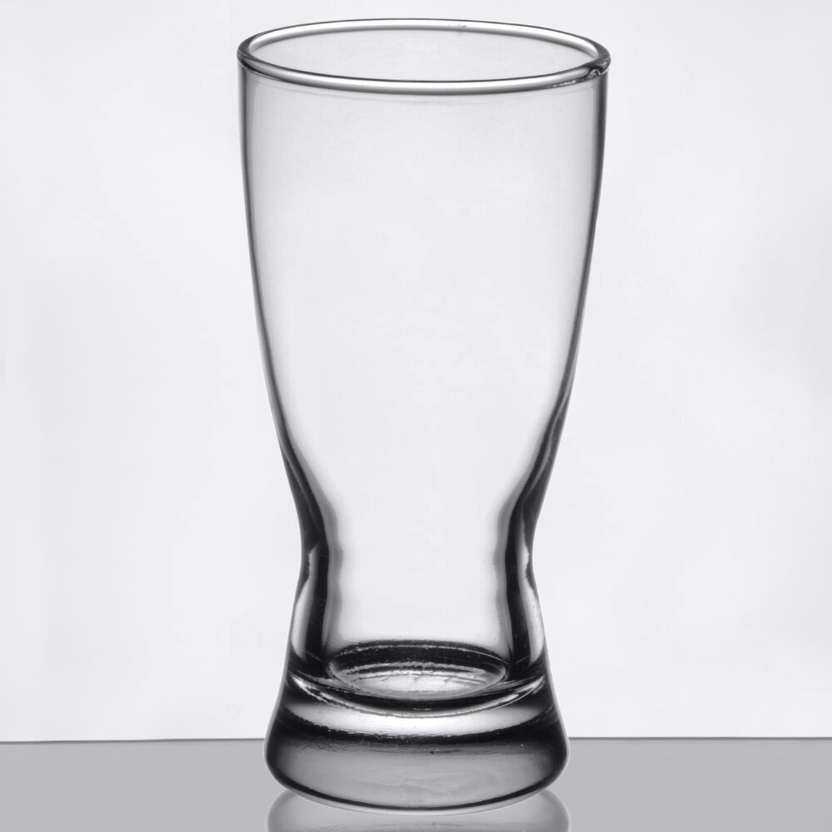 Libbey 1178HT 10 oz hourglass pilsner glass with thick sham base, clear glass on neutral background
