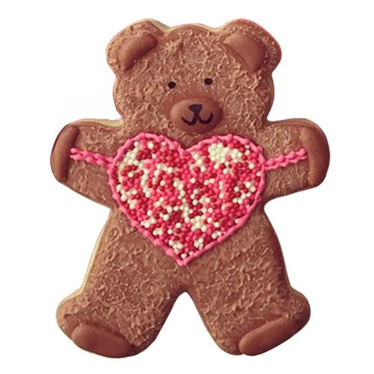 Decorated teddy bear shaped cookie with brown icing and a pink heart sprinkle design