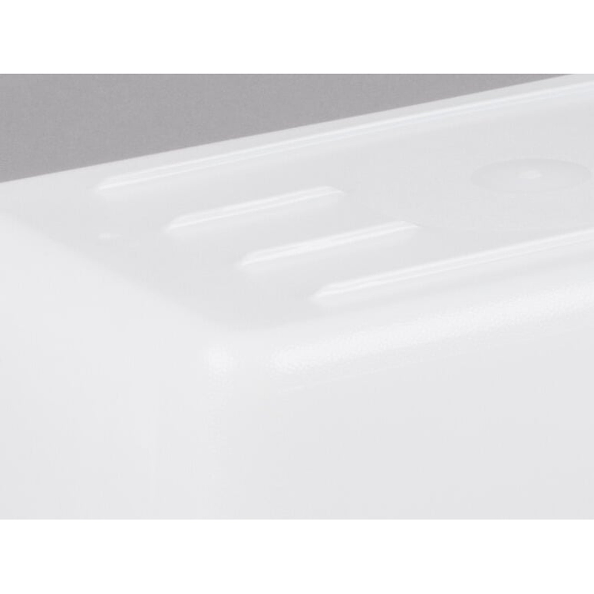 Close-up of the textured ribbed bottom interior of the Cambro food storage box