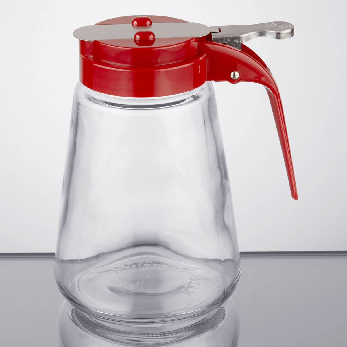 TableCraft 1371RE 12 oz. glass syrup dispenser with red ABS top and chrome thumb-lever pour spout on neutral background