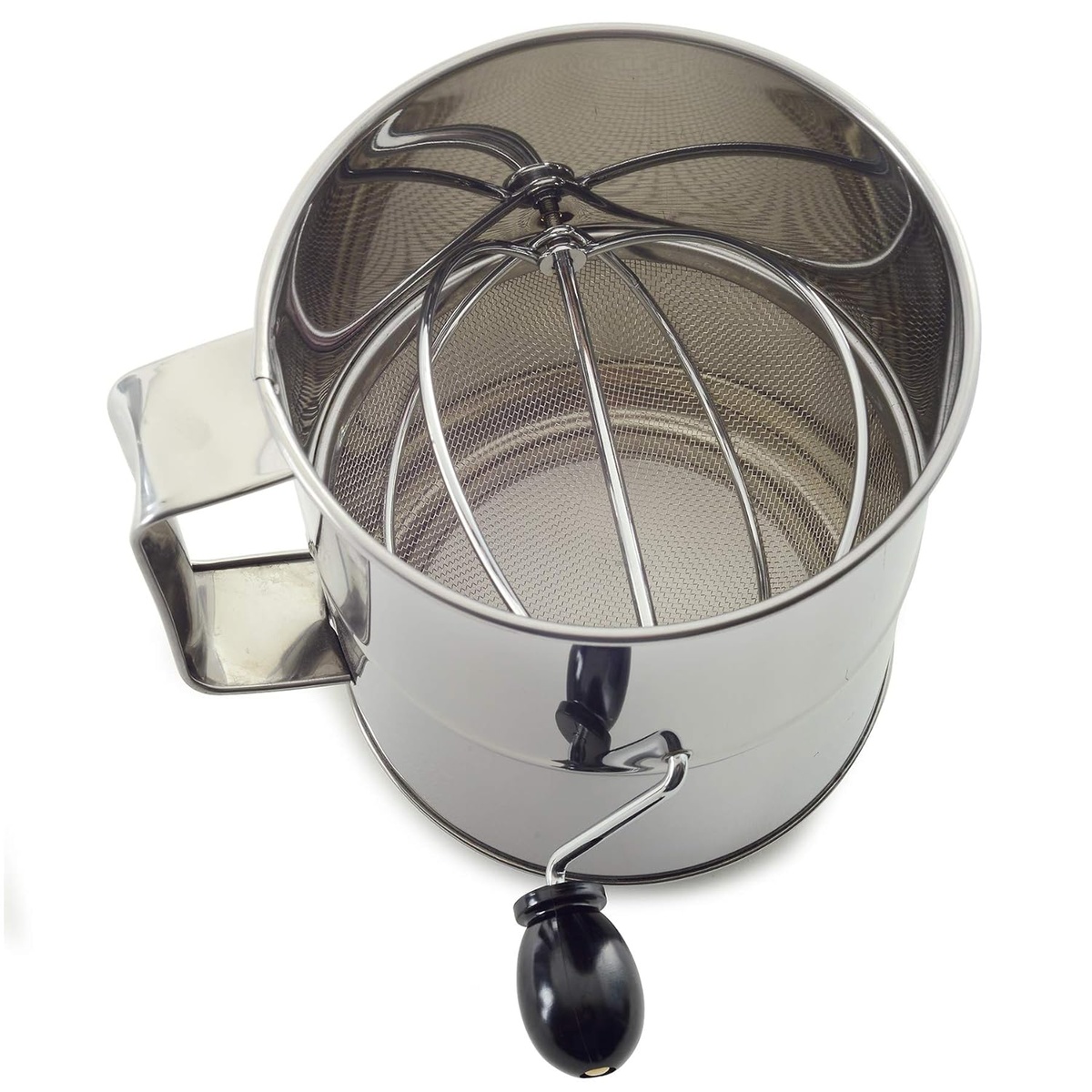 Top-down view of Norpro flour sifter showing fine stainless steel mesh screen and wire agitator basket