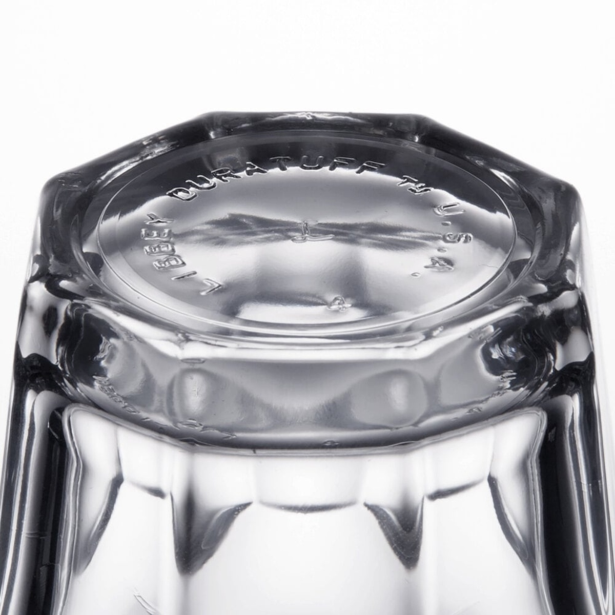 Close-up of the octagonal base of the Libbey Gibraltar glass showing the embossed DuraTuff and Libbey USA markings