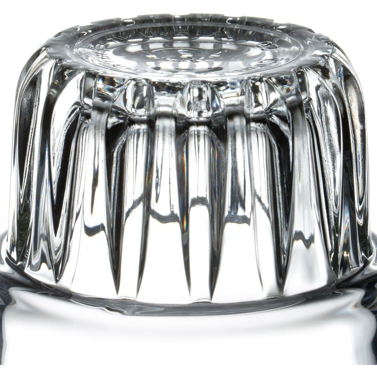 Close-up of Libbey Everest glass recessed base showing deeply chiseled symmetrical ridge pattern