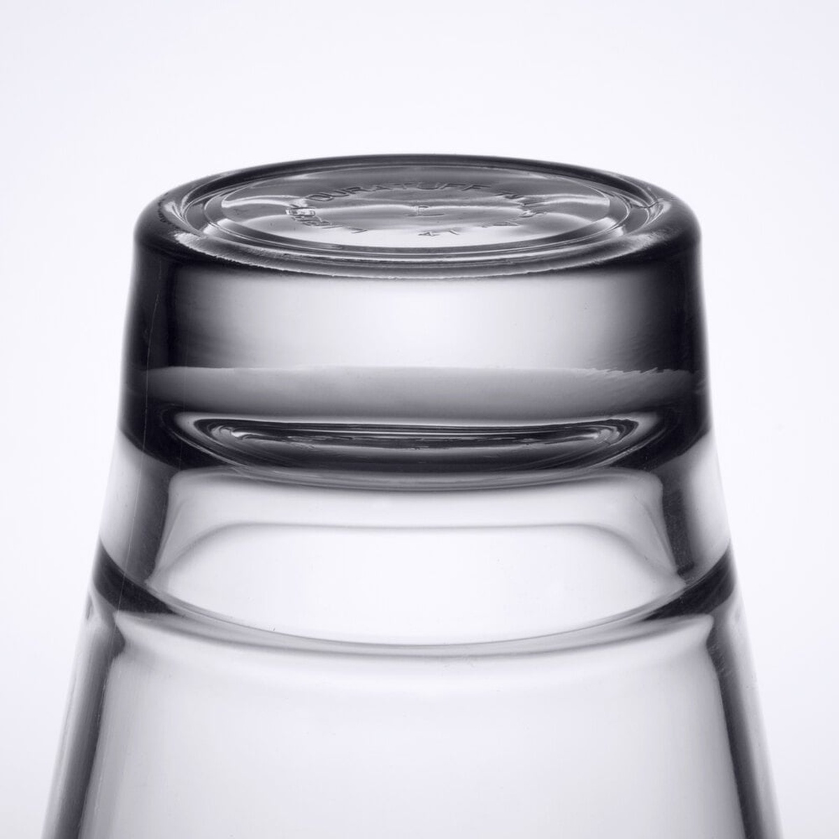 Close-up detail of two Libbey Endeavor rocks glasses stacked, showing the interlocking base and DuraTuff embossed marking