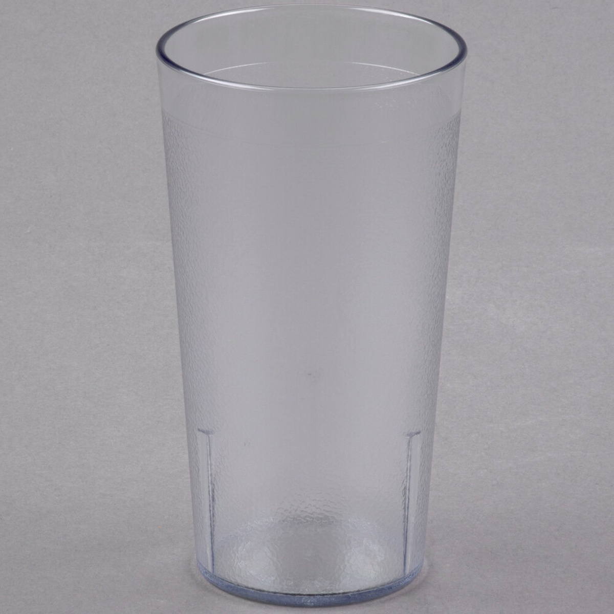 Cambro 1600P152 clear SAN plastic tumbler with textured exterior and visible interior stacking lugs