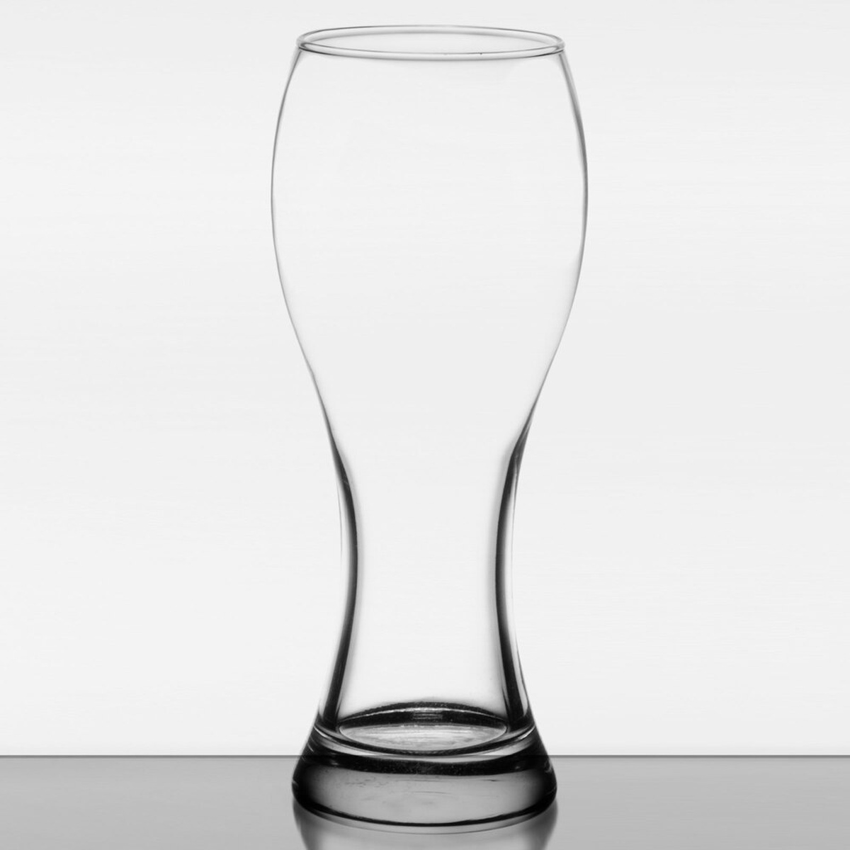 Libbey 1611 23 oz. giant pilsner beer glass, empty, showing contoured hourglass shape and thick base