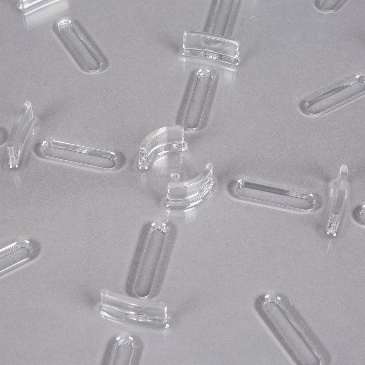 Close-up of Cambro drain shelf showing raised drainage slots and raised nub pattern