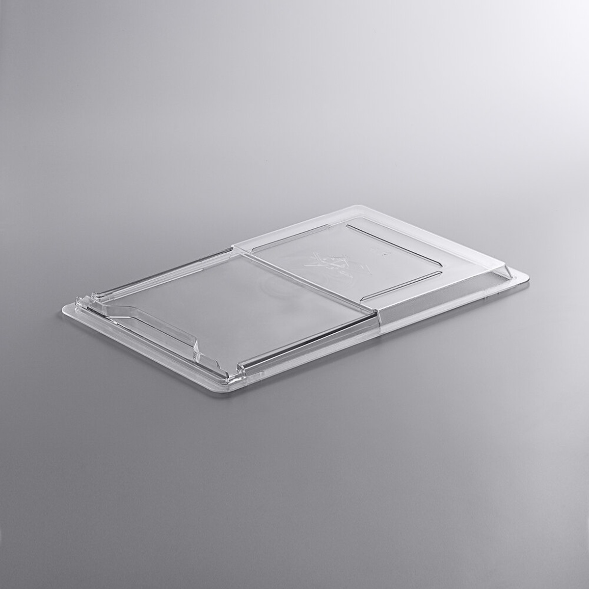Cambro 1826SCCW135 clear polycarbonate sliding lid shown at an angle, displaying the sliding panel mechanism and molded rails