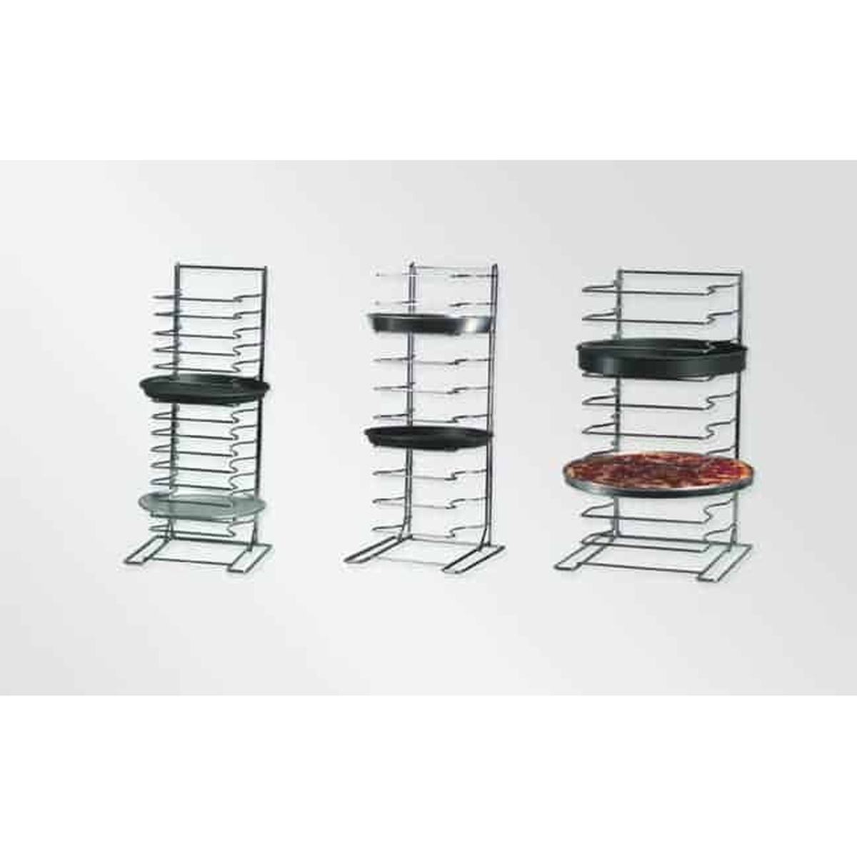 Three American Metalcraft chrome pizza pan racks shown side by side loaded with pizza pans and a baked pizza