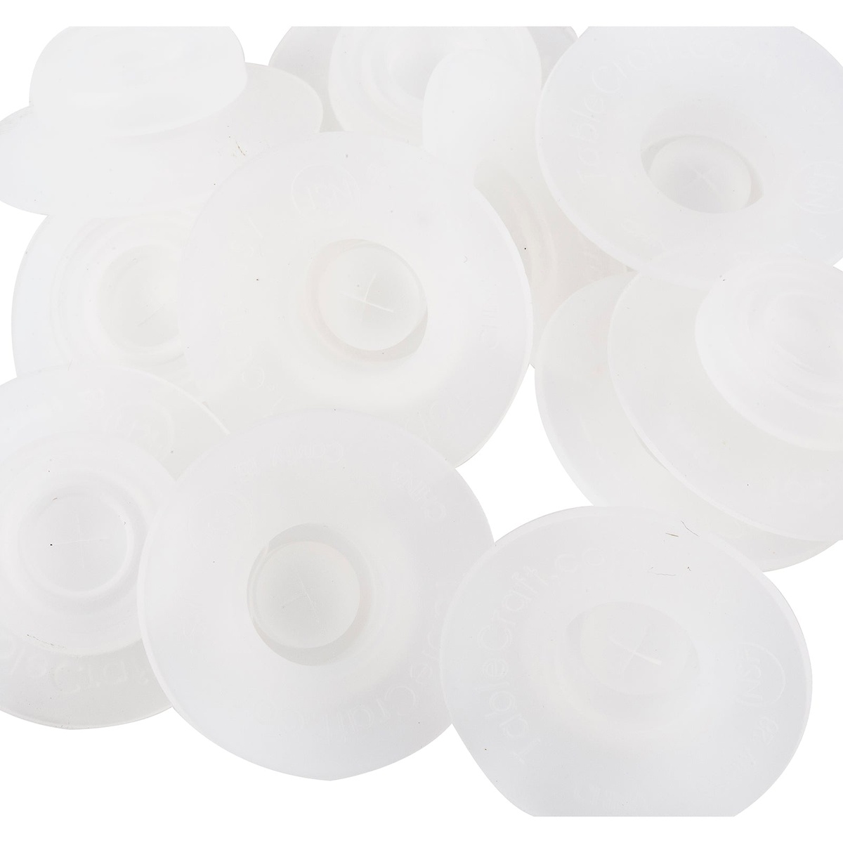 Multiple Tablecraft 1SV silicone valves grouped together on white background