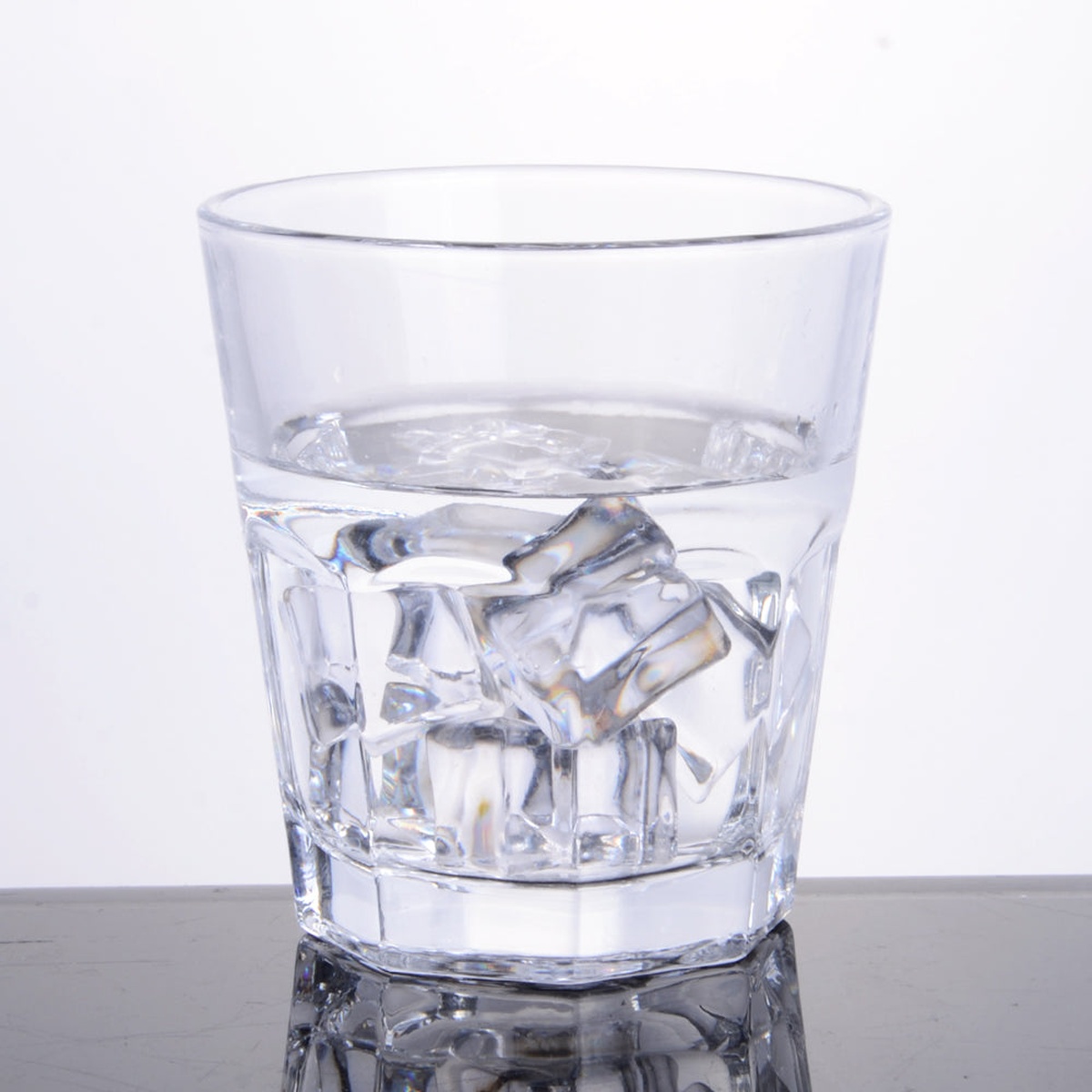 Enhanced Glassware 12 oz glass tumbler filled with ice water, showcasing clarity and volume