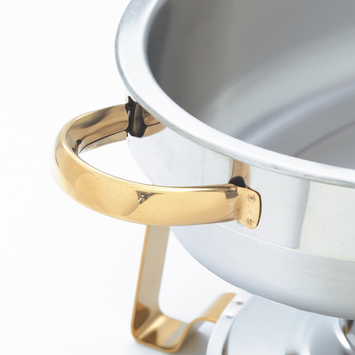 Close-up of the polished gold-tone easy-grip handle on the Winco 202 Malibu chafer