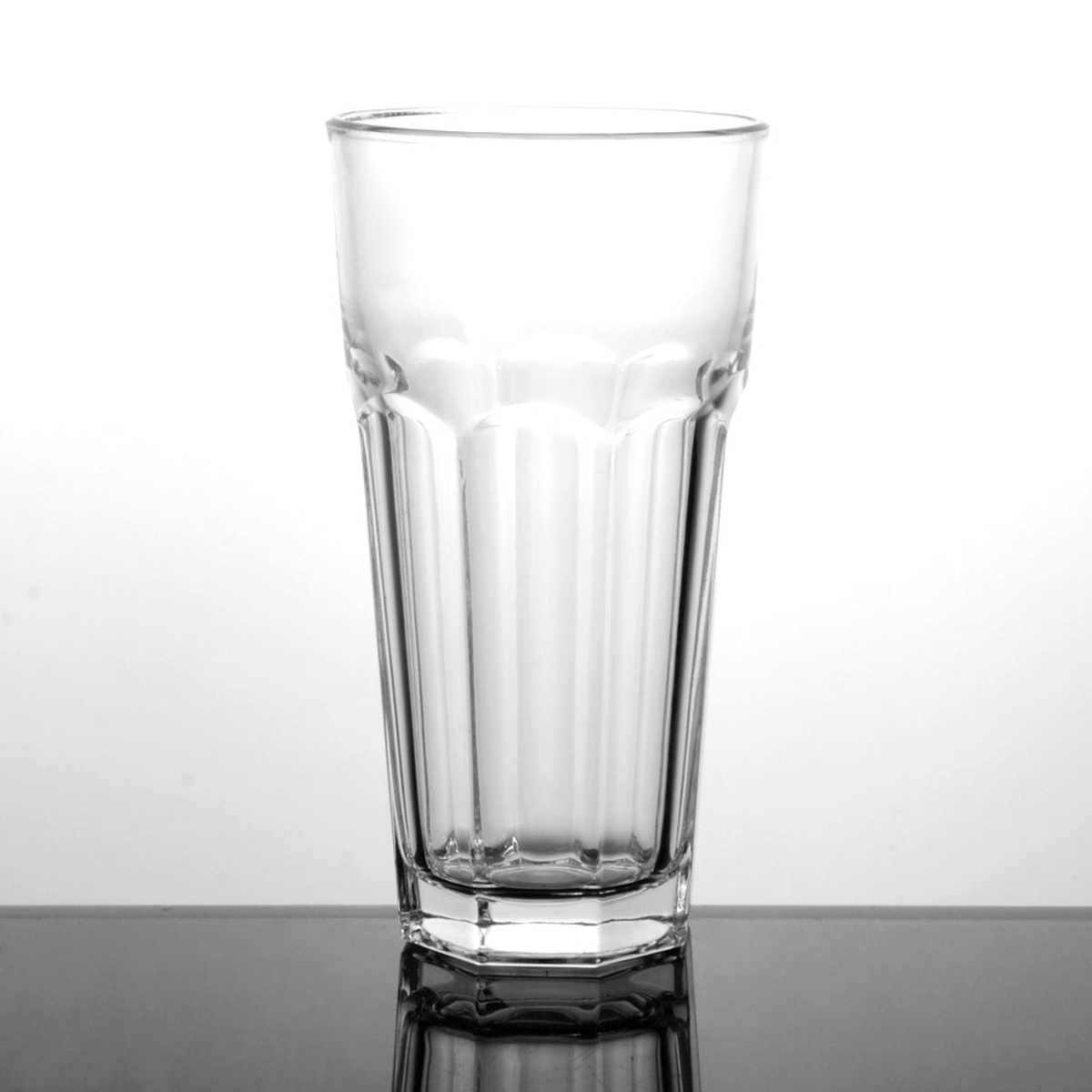Enhanced Glassware 22 oz paneled glass tumbler with ribbed body and octagonal base