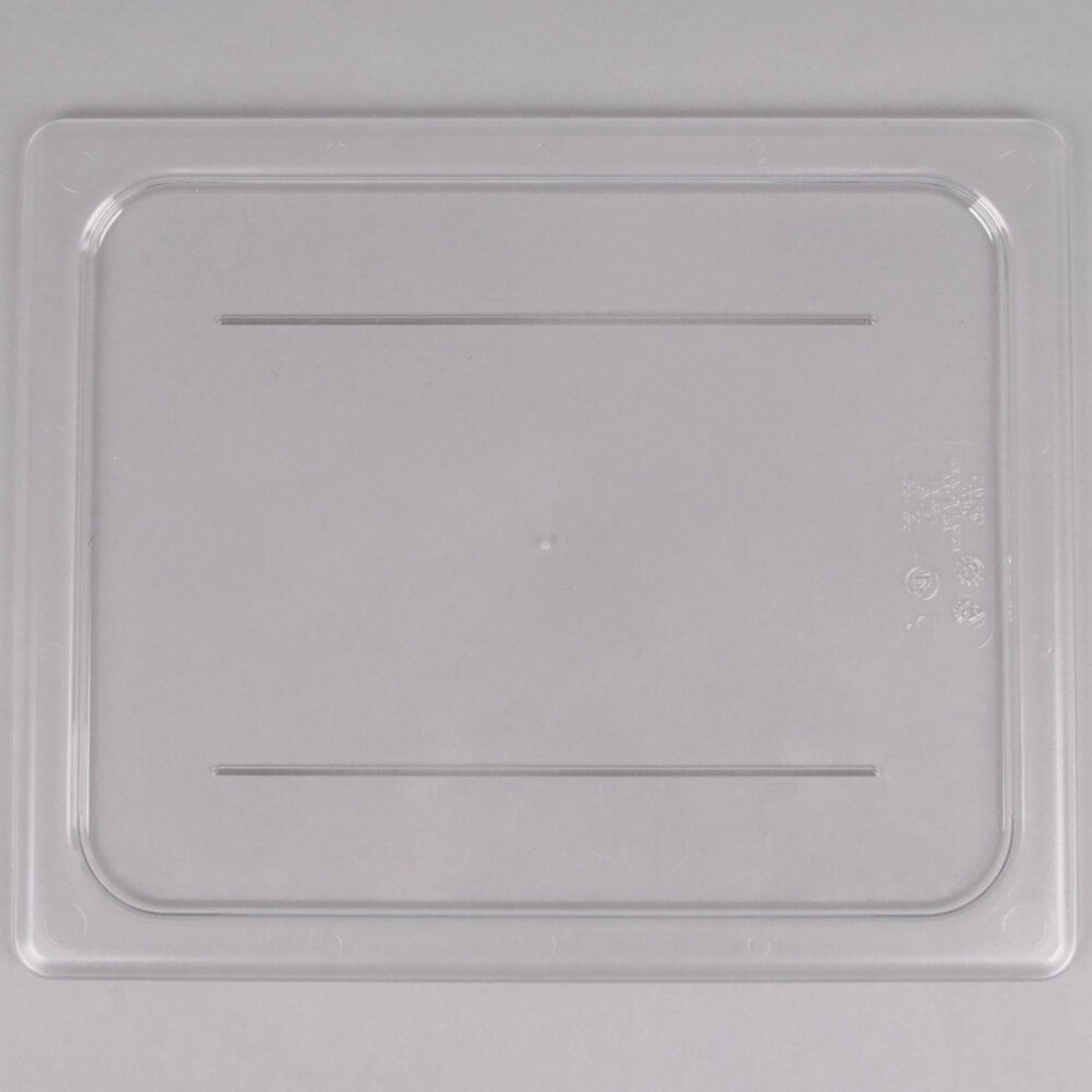 Cambro 20CWC135 Camwear 1/2 size clear polycarbonate flat lid, top-down view showing rectangular shape with molded ridges and rounded corners