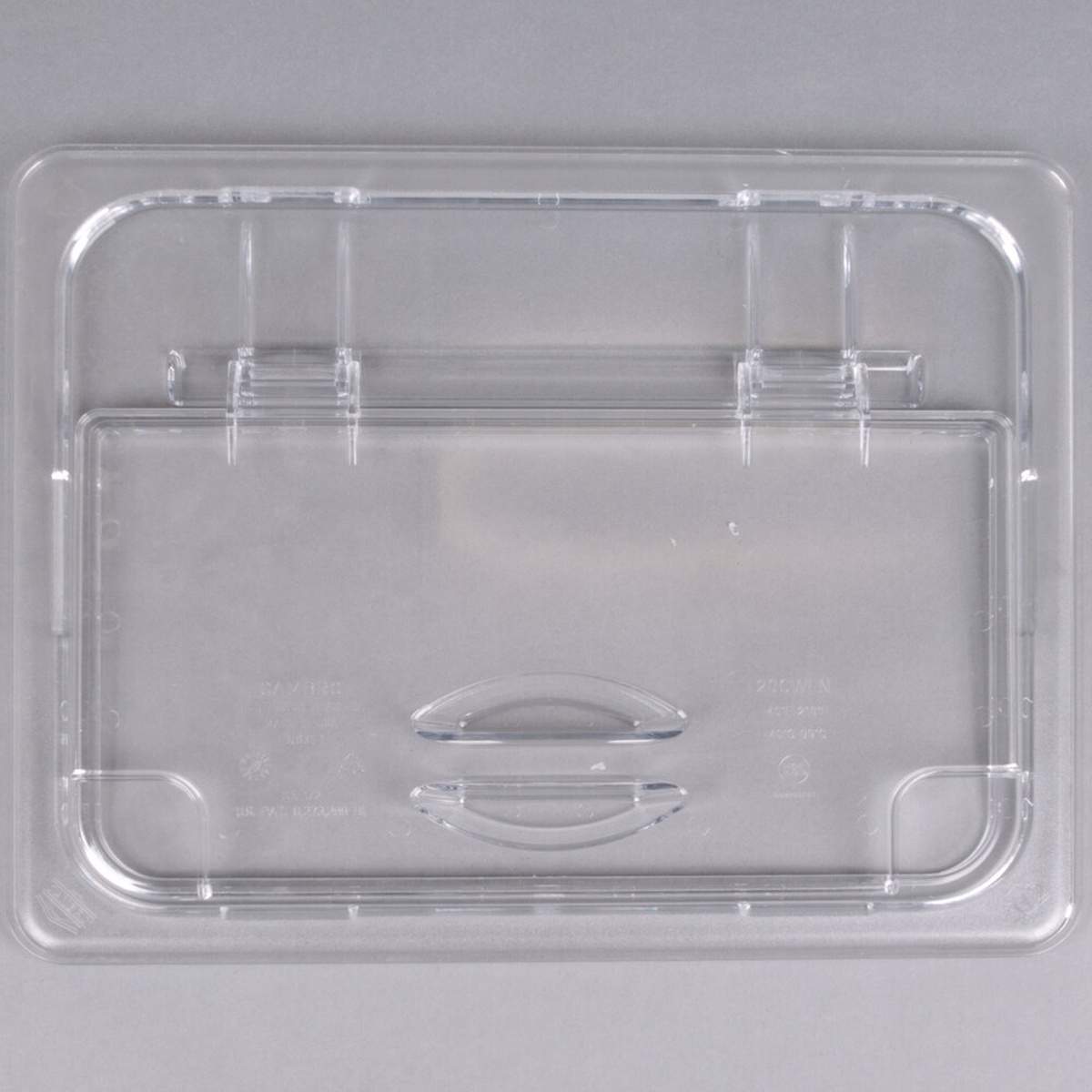 Cambro 20CWLN135 clear polycarbonate 1/2 size FlipLid with spoon notch and molded handle, top-down view