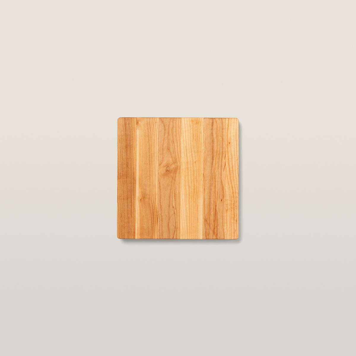Boos Block maple cutting board top view on a neutral background