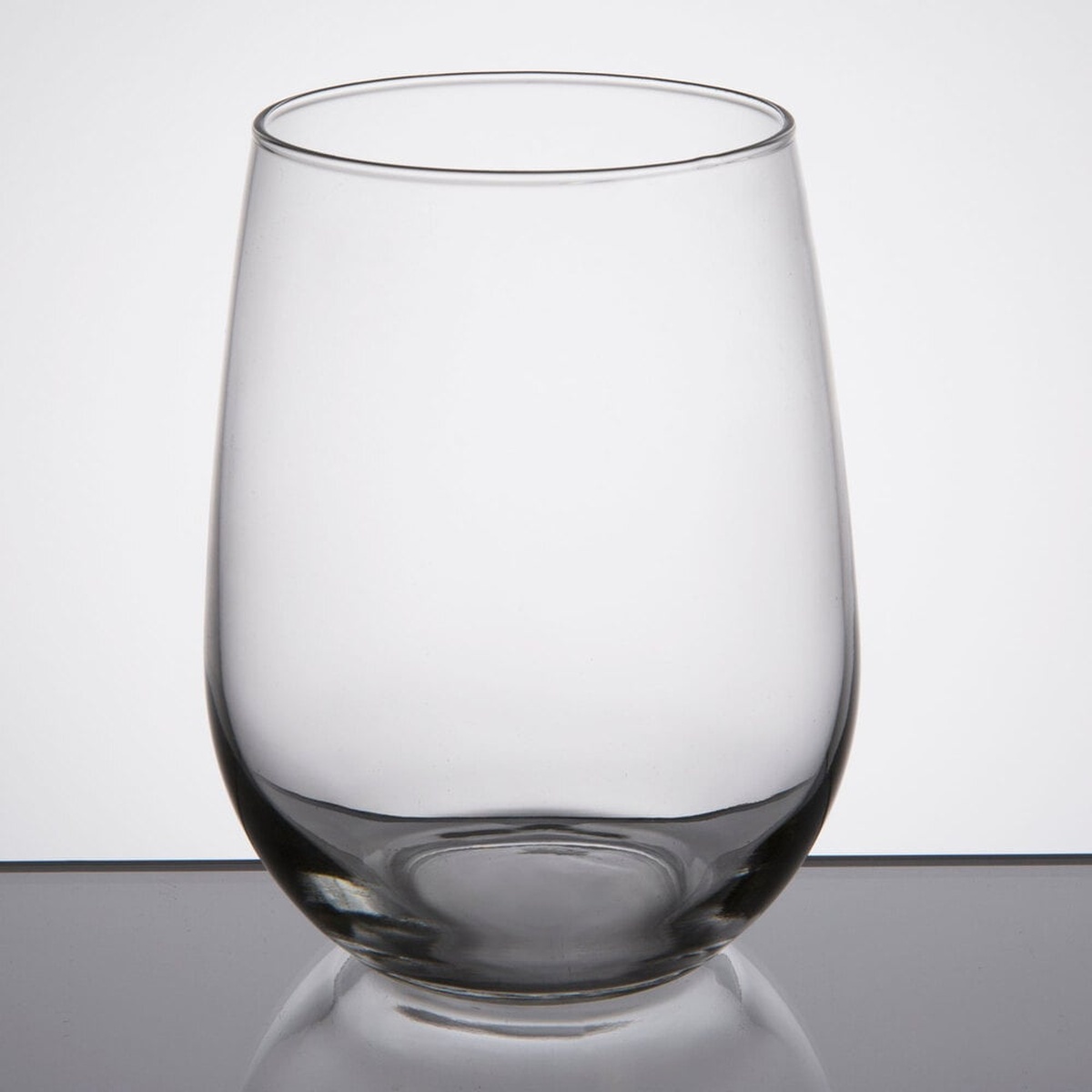 Libbey 221 stemless white wine glass, clear, full view on neutral background