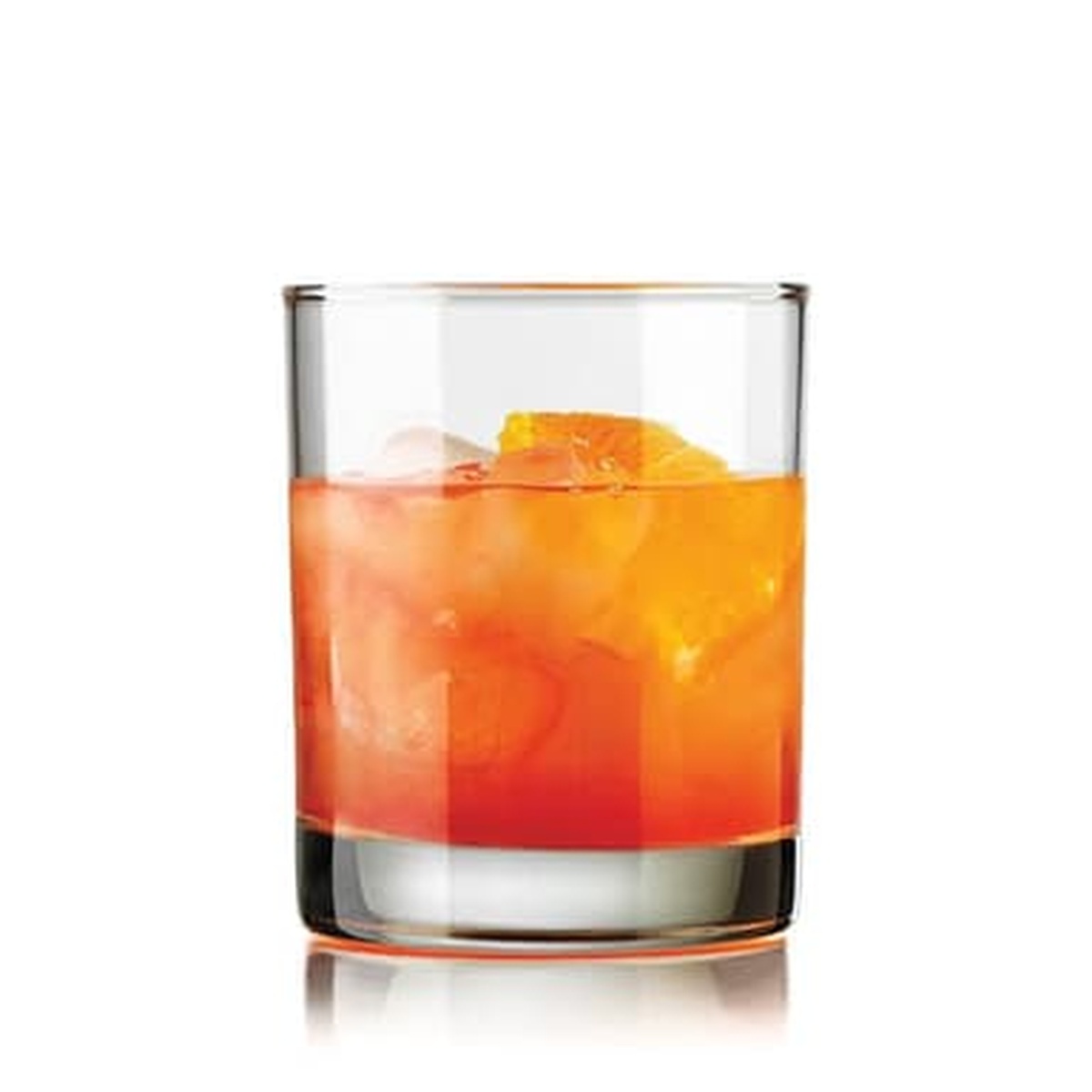 Libbey Lexington Double Old Fashioned glass filled with an orange cocktail and ice on a white background