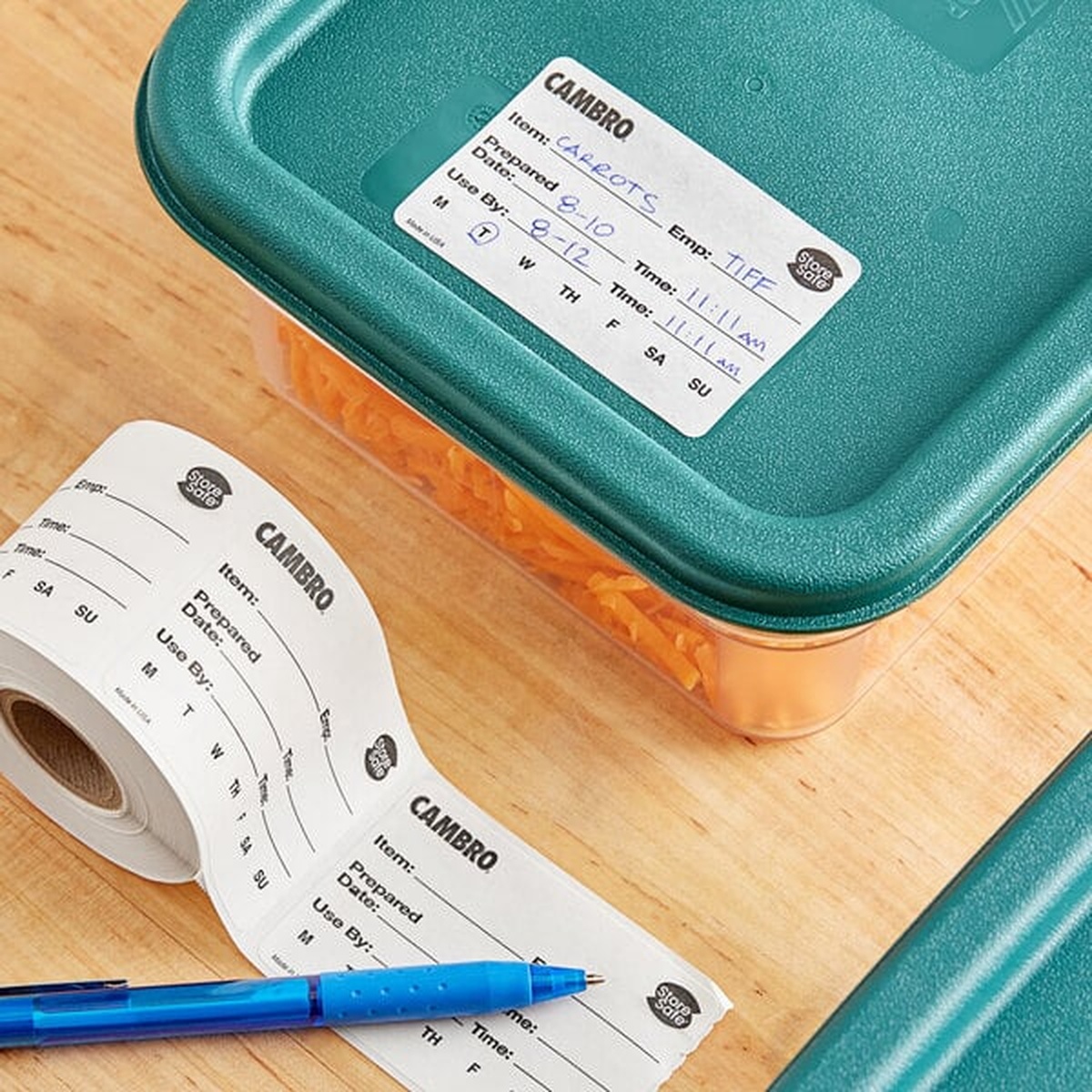 Cambro StoreSafe label applied to a food storage container with handwritten prep details