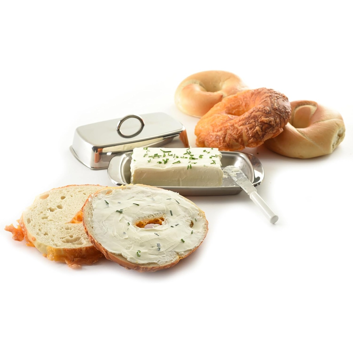 Butter dish holding a block of cream cheese with bagels