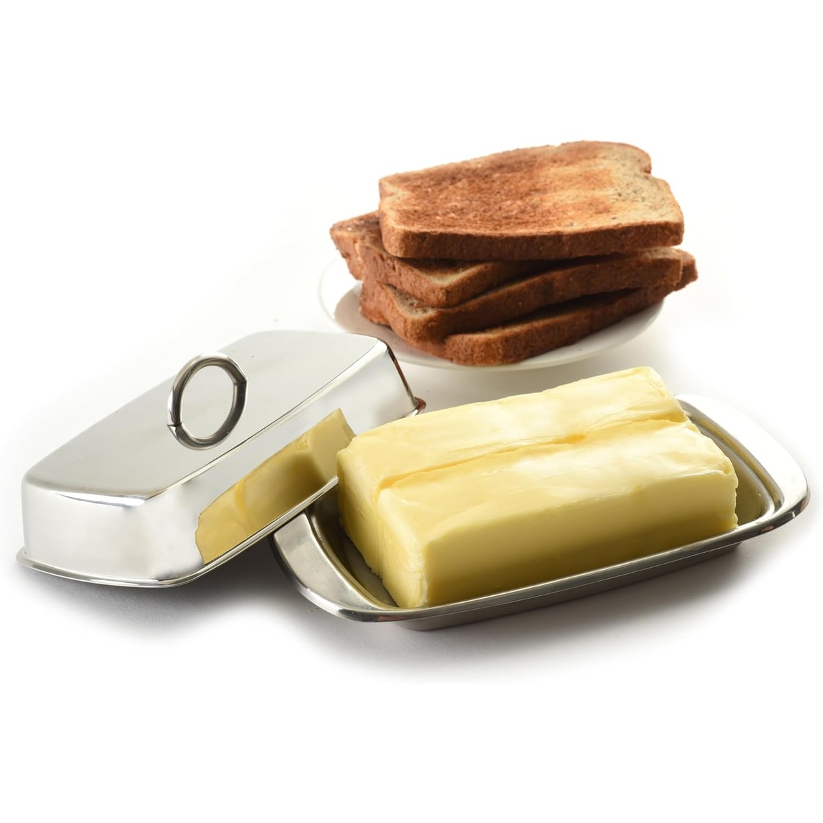 Open butter dish showing two sticks of butter next to toast