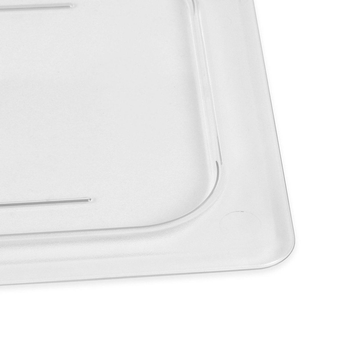 Close-up corner detail of Cambro 30CWC135 clear polycarbonate flat food pan cover showing rounded edge and raised lip