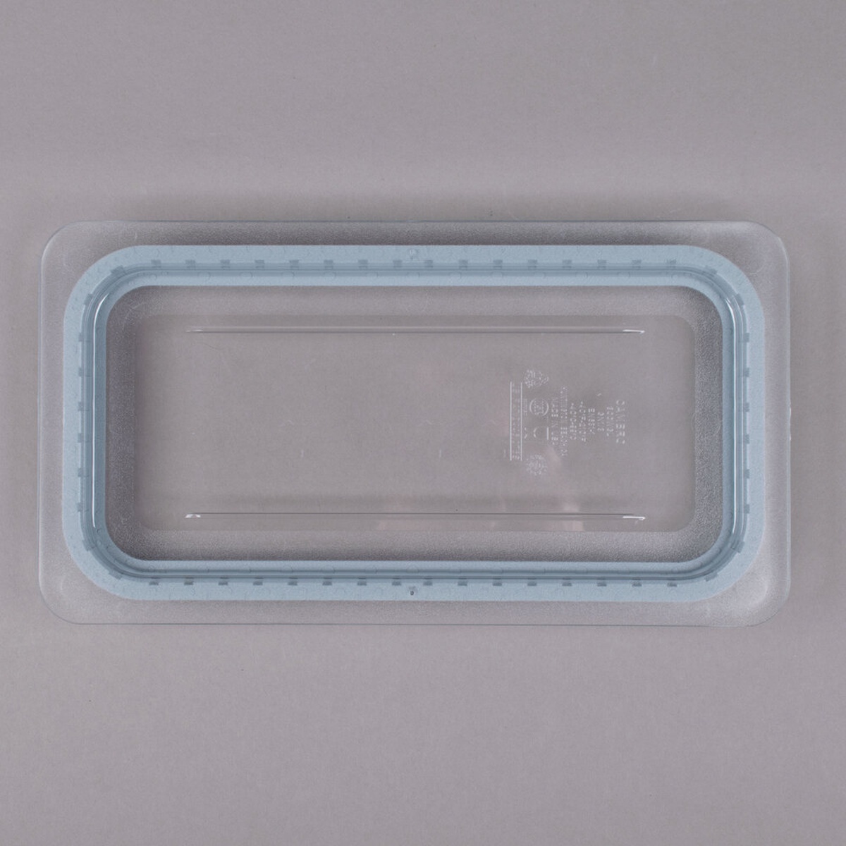 Cambro 30CWGL135 1/3 size clear polycarbonate GripLid, top-down view showing molded-in polyurethane gasket around perimeter