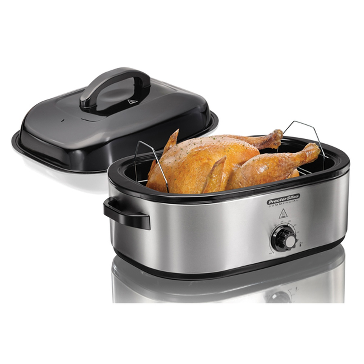 Hamilton Beach 32921 roaster oven open with a whole turkey on the removable rack and dome lid set to the side