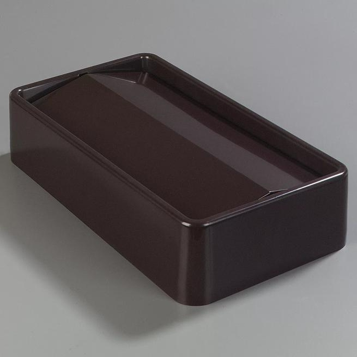 Dark brown TrimLine swing top waste container lid showing hinged swing door panel, angled view on gray background
