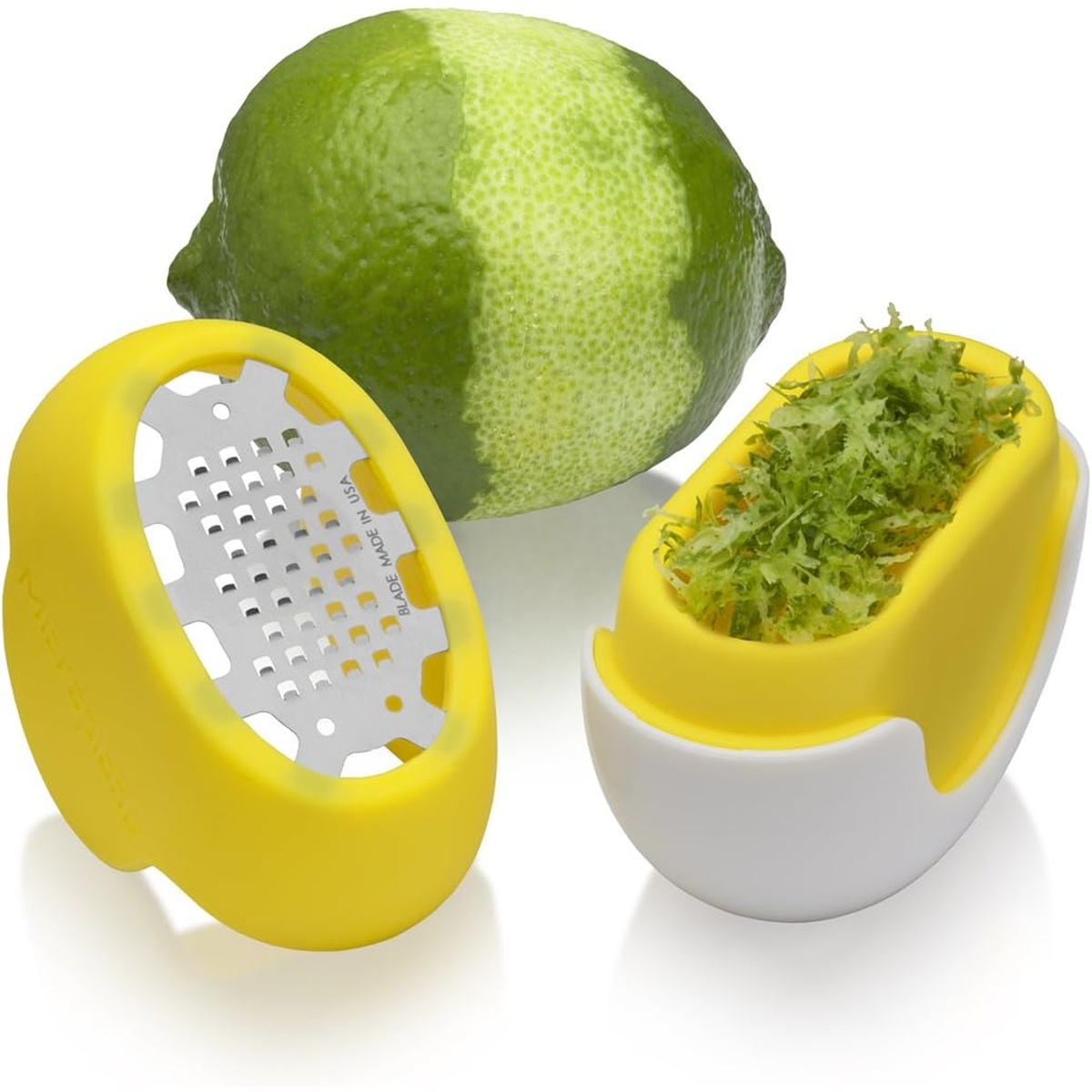 Yellow Flexi Zesti shown open with a lime and fresh green zest