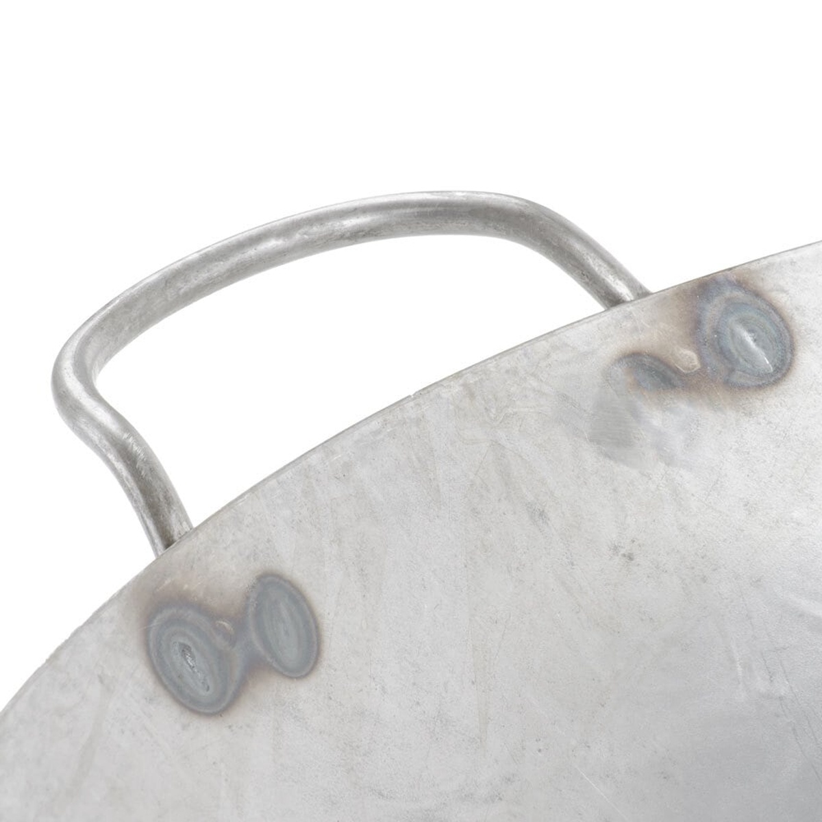 Close-up of welded metal loop handle on the Town 34718 Cantonese wok showing sturdy weld points