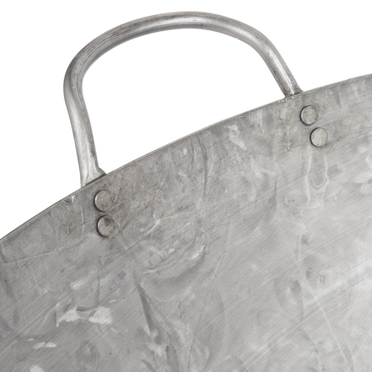 Close-up detail of the riveted metal loop handle on the Town 34730 Cantonese wok showing two visible rivets