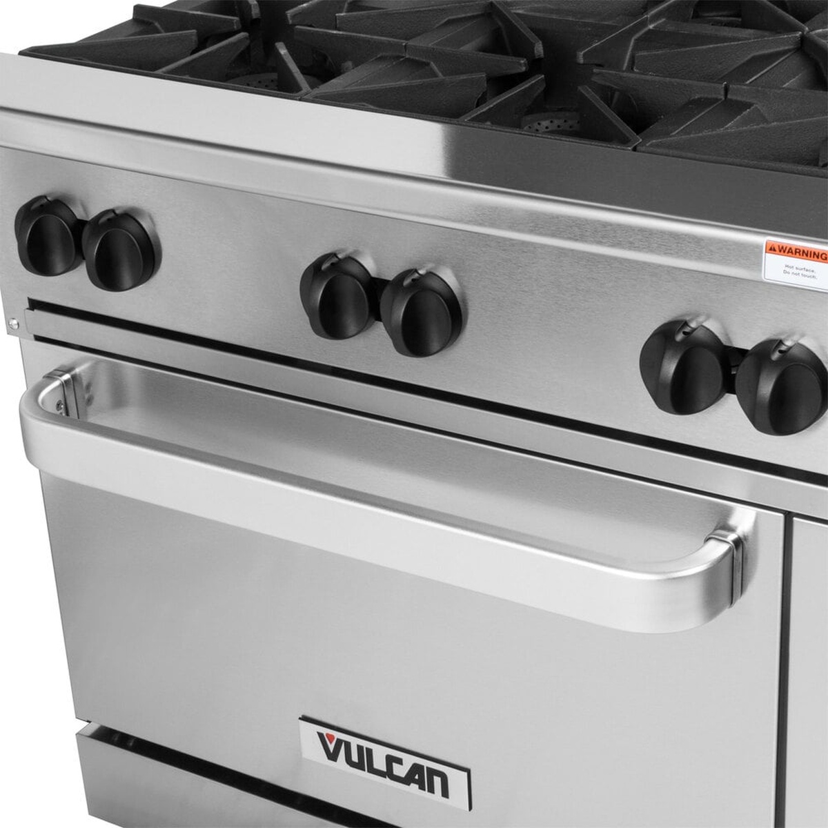 Close-up of Vulcan range front panel with burner control knobs and oven handle