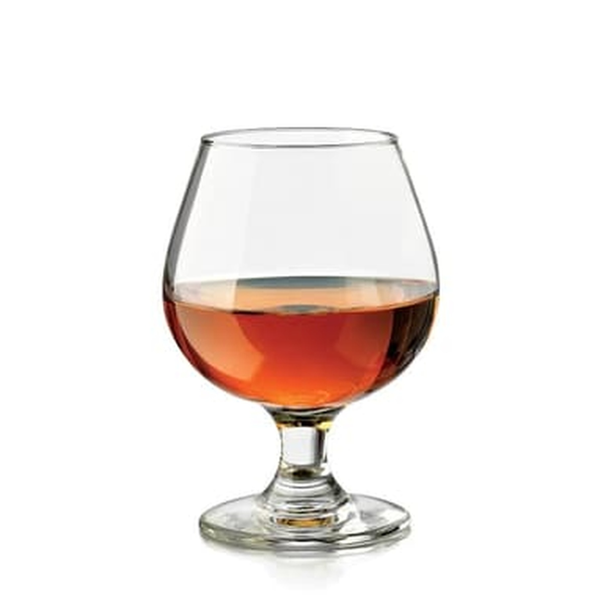 Libbey 3705 Embassy brandy glass filled with amber brandy, showing the rounded bowl and footed base