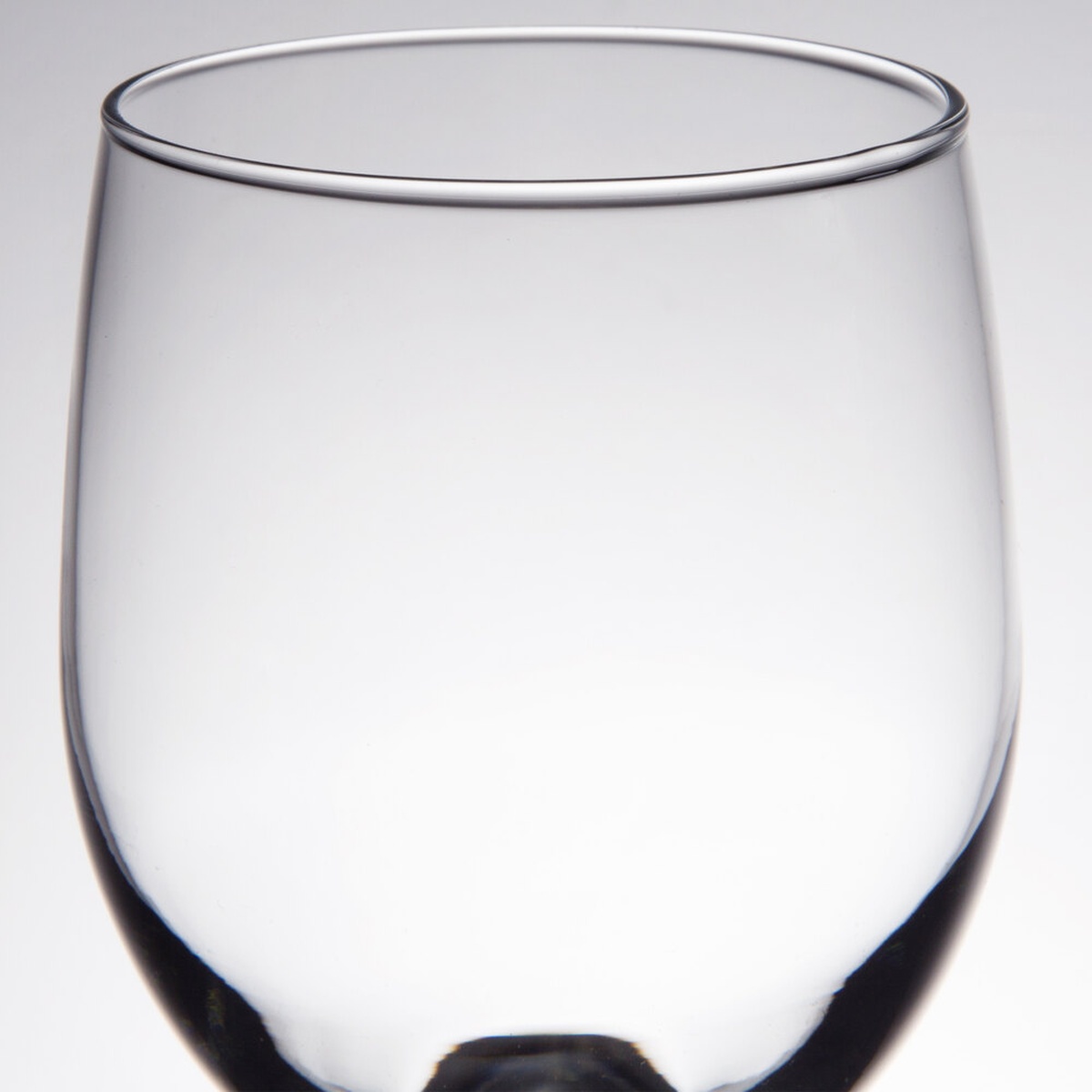 Close-up of the chip-resistant rim of the Libbey Embassy goblet showing clean, smooth glass edge