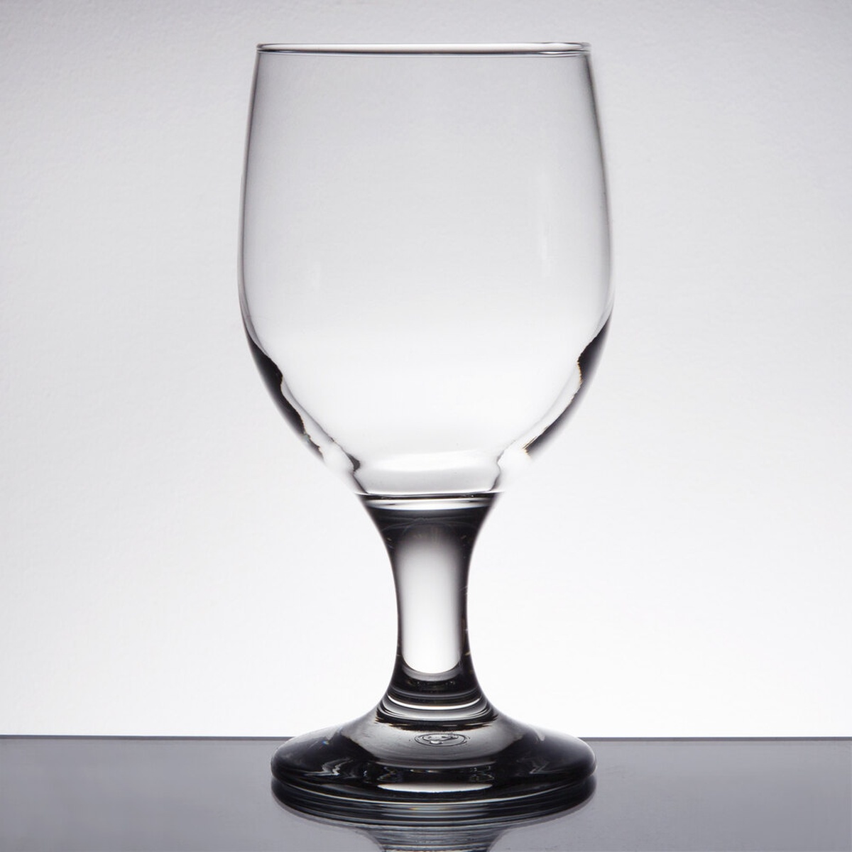 Libbey 3711 Embassy goblet side profile on reflective surface showing full bowl, stem, and base