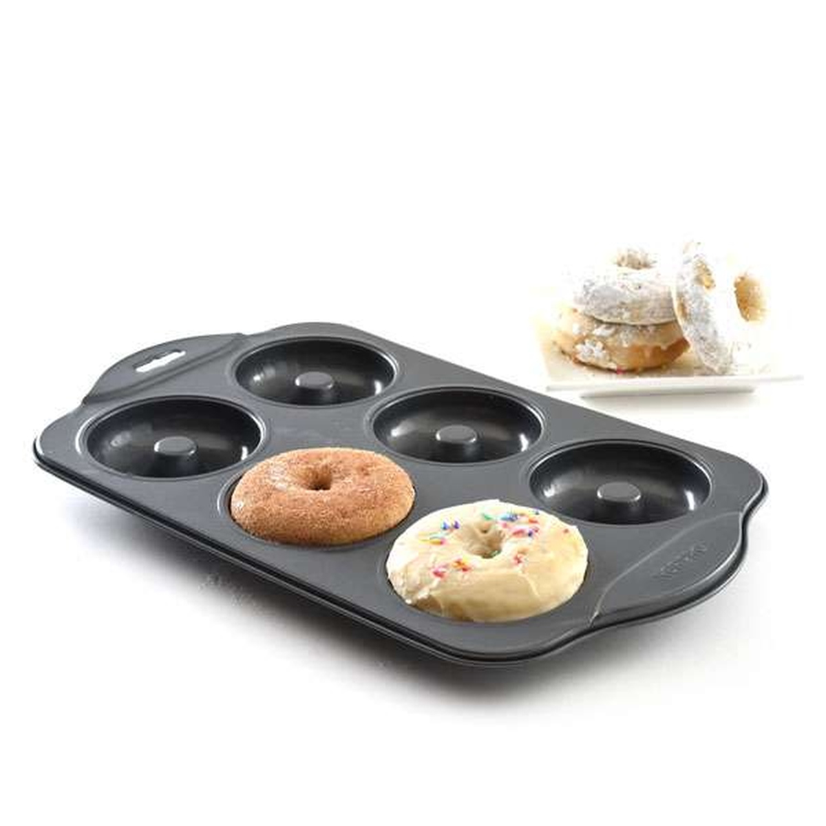 Norpro donut pan with freshly baked glazed and cinnamon-sugar donuts