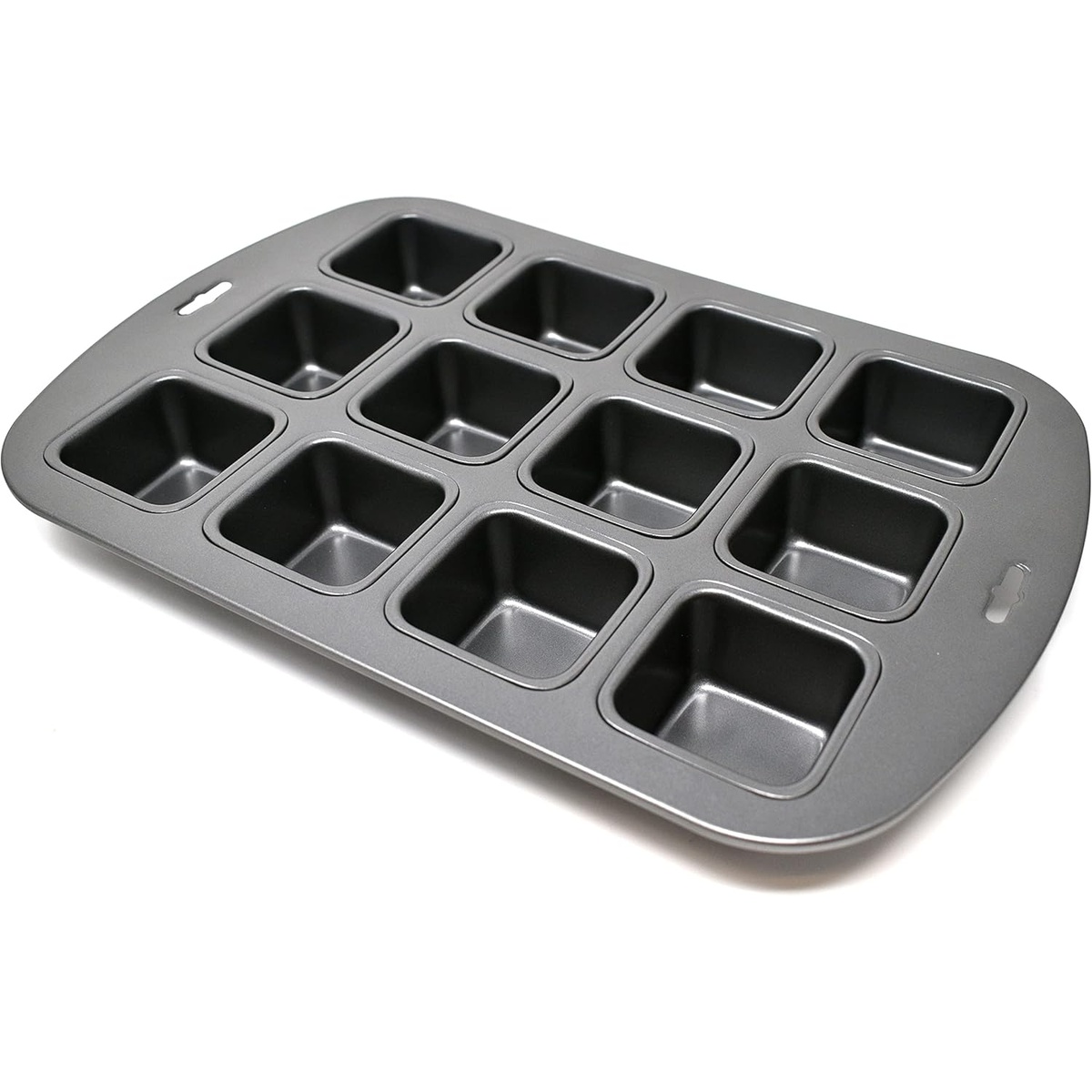 Angled view of the Norpro 12-cavity square mini cake pan showing the deep square wells and gray non-stick surface