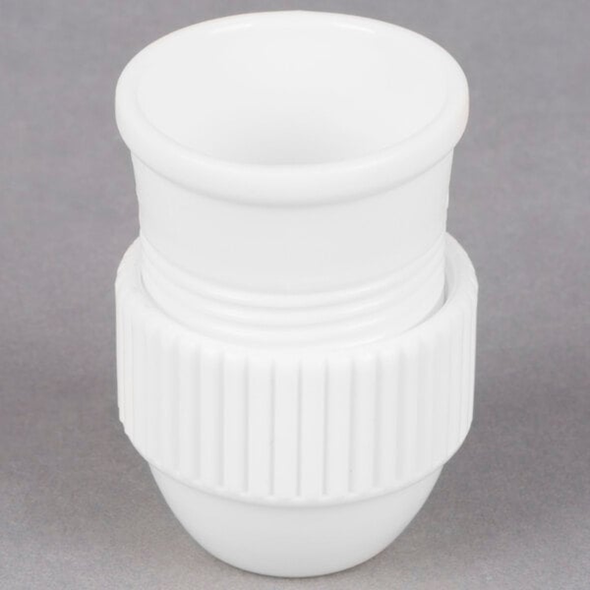 Ateco 402 medium plastic coupler fully disassembled showing the base and two coupler rings stacked
