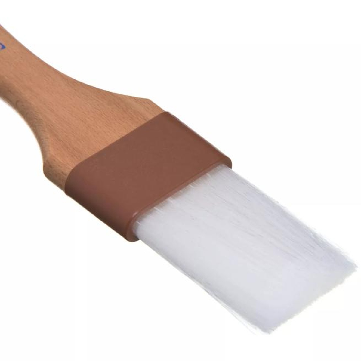 Close-up of soft-flagged white nylon bristles with brown ferrule on Sparta pastry brush
