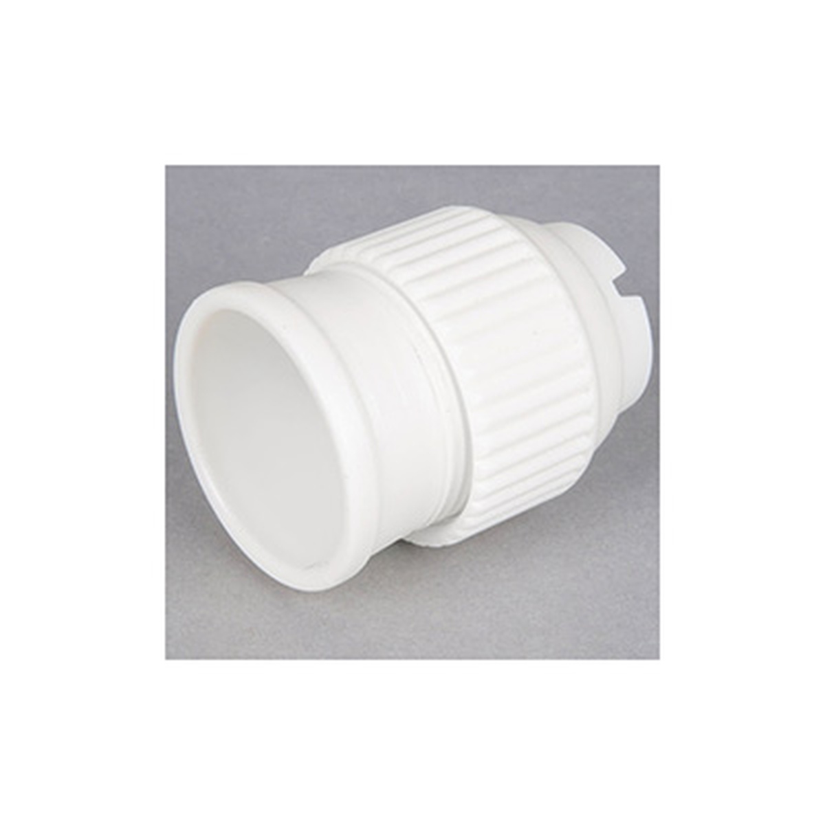 Ateco 404 large white plastic coupler fully assembled at an angle, showing ridged ring and tapered base