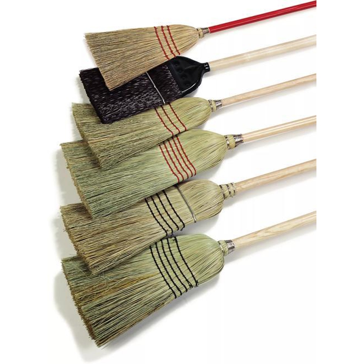 Assorted Sparta upright brooms lineup showing multiple styles and bristle types on white background