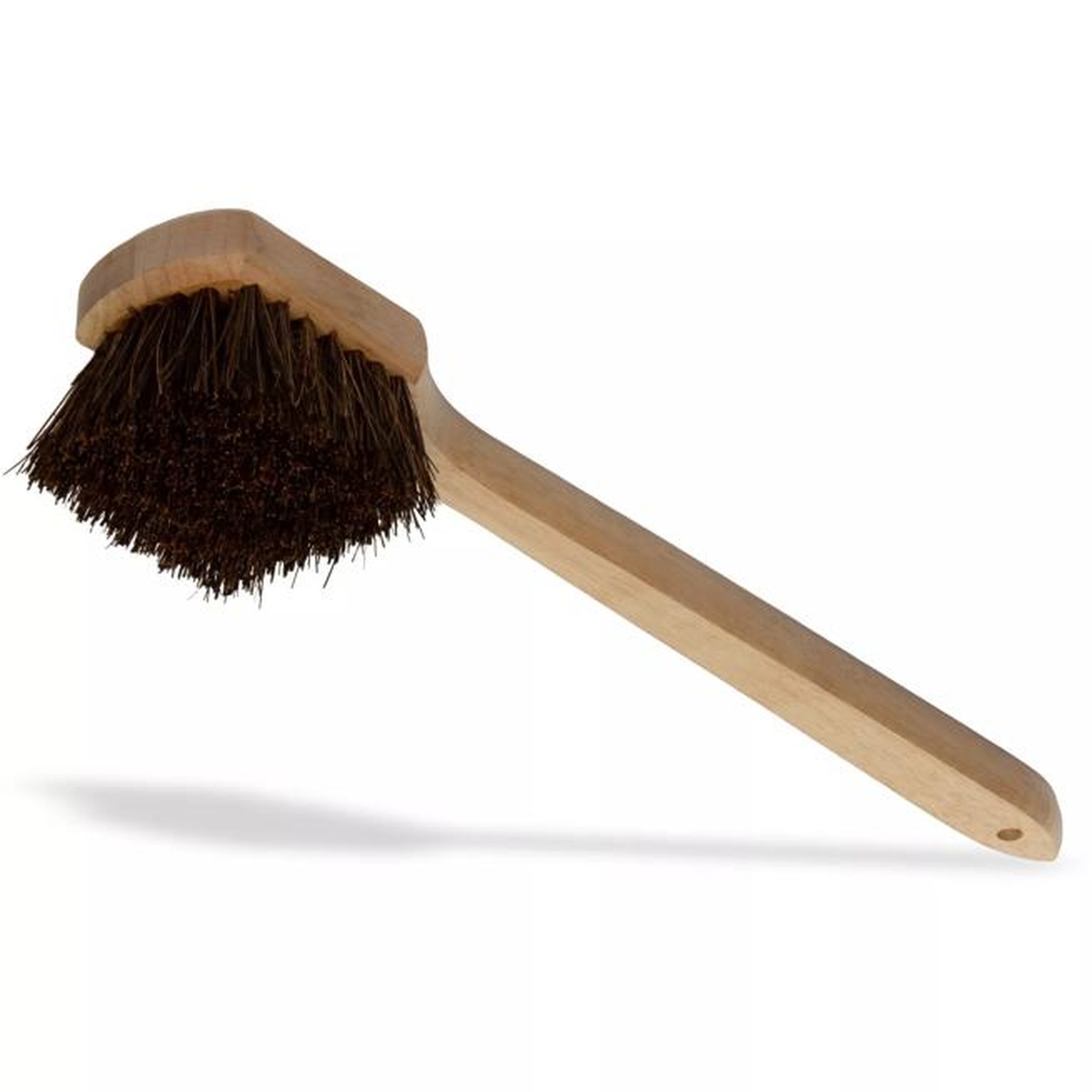 Overhead angled view of Sparta utility scrub brush highlighting the dense palmyra bristle cluster and natural hardwood handle