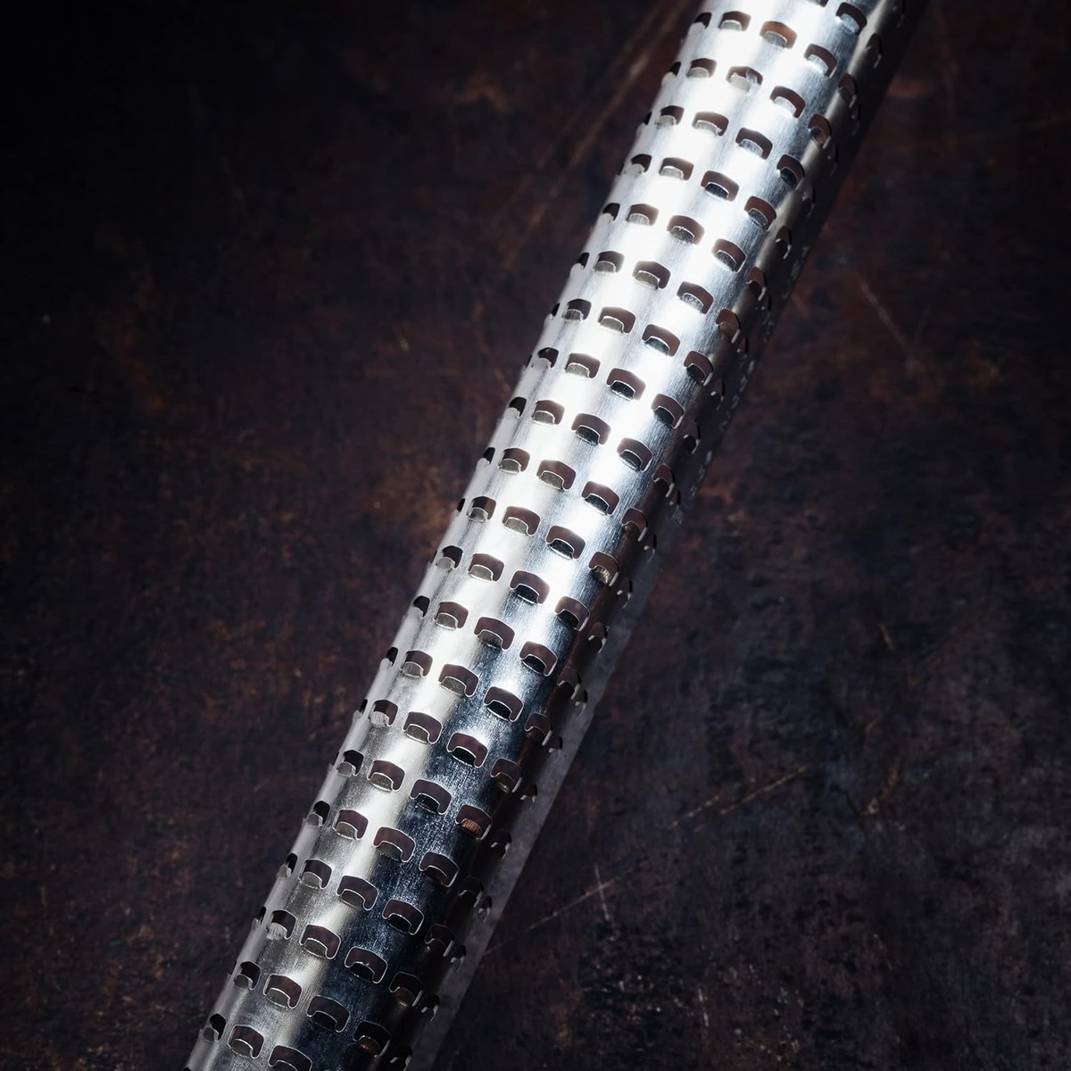Close up detail of the ultra-sharp photo-etched stainless steel grating surface